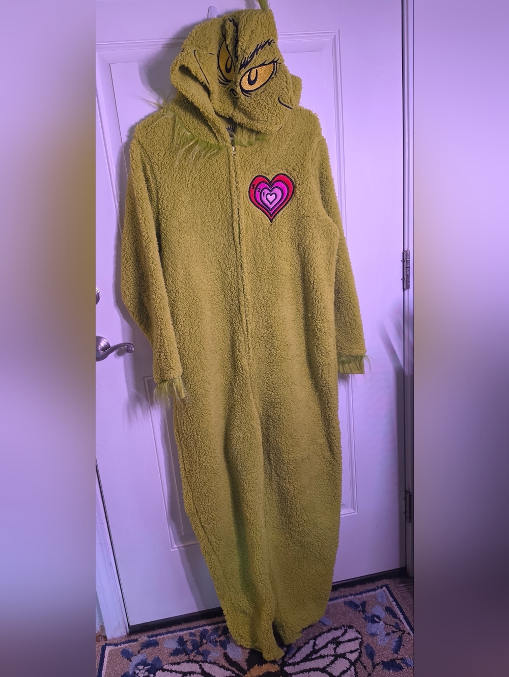 The GRINCH Cozy Olive Green Sherpa Onesie with Heart Patch